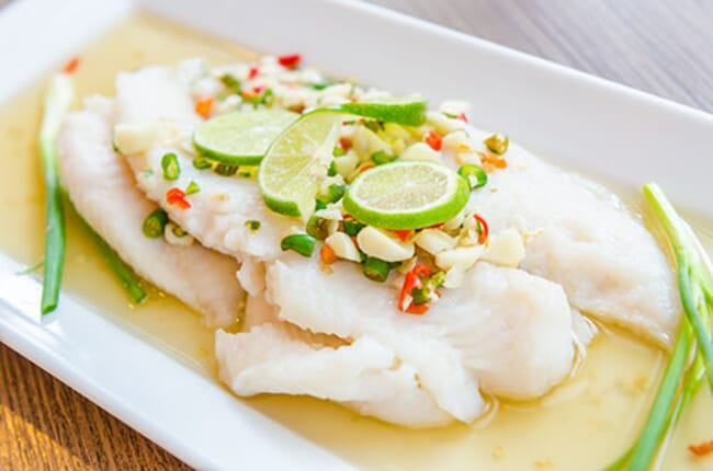 Cooked white fish on a plate